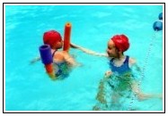 Swimming at Camp Potomac Woods and having fun with Noodles!